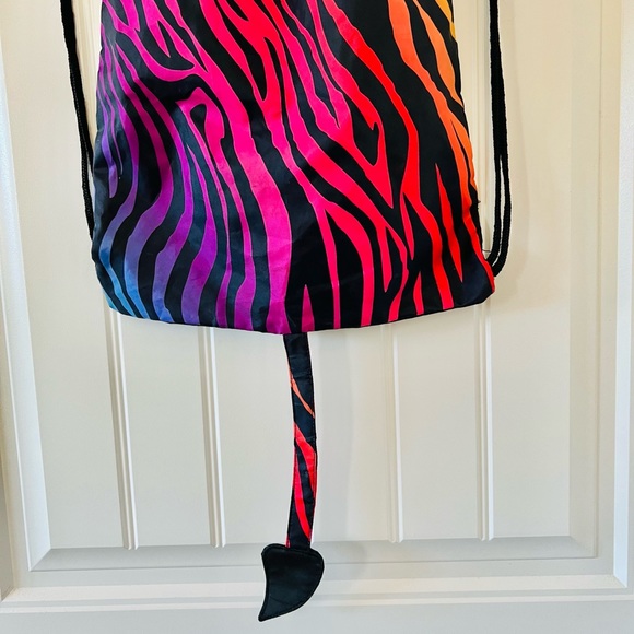 Spirit Halloween Drawstring Rainbow & Tiger Stripe Backpack with Dragon Tale - Picture 3 of 8
